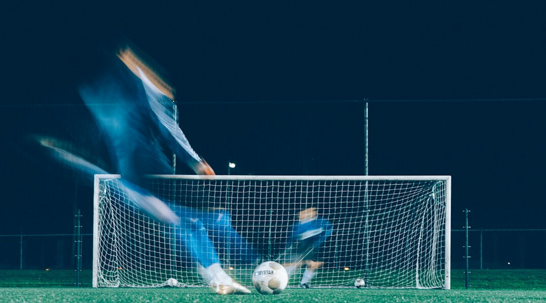 football player in action on pitch